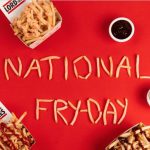 Fries are placed on a red background and are used to spell out "National Fry Day"